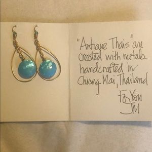 Brand new bluish color dangle earrings